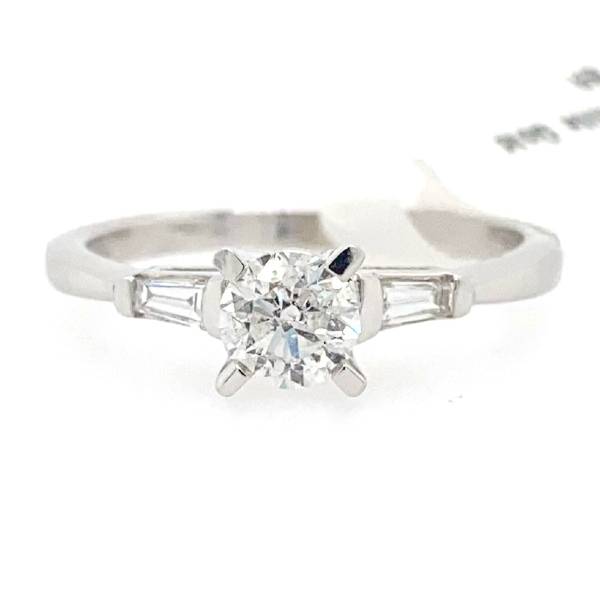 Round Diamond and Baguettes Engagement Ring