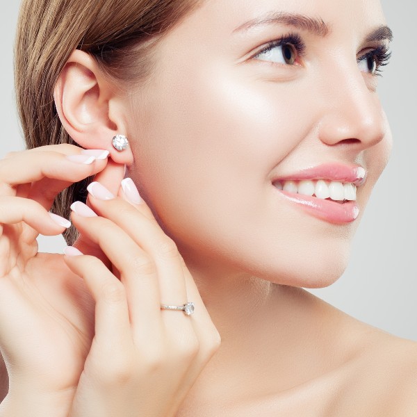 girl wearing diamond earrings