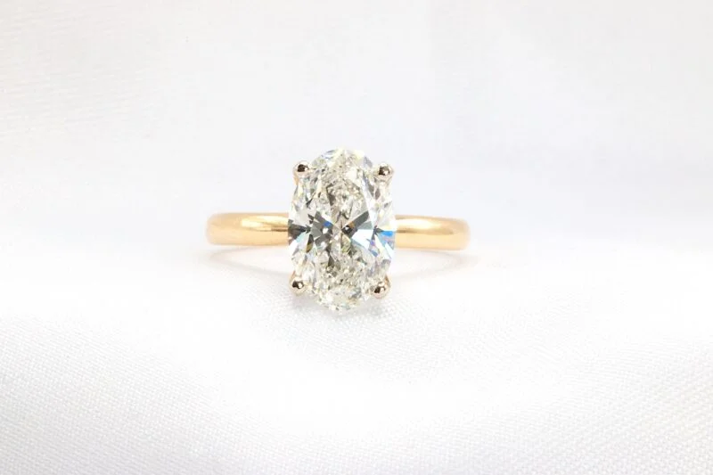 2 carat lab oval solitaire diamond engagement ring yellow gold