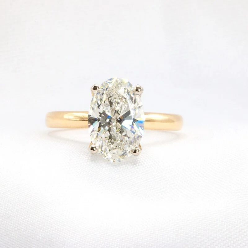 2 carat lab oval solitaire diamond engagement ring yellow gold