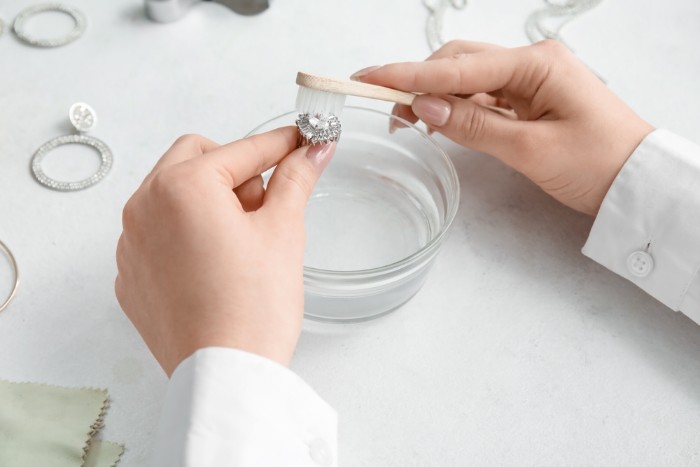 How to clean diamond earrings at home using soap and toothbrush