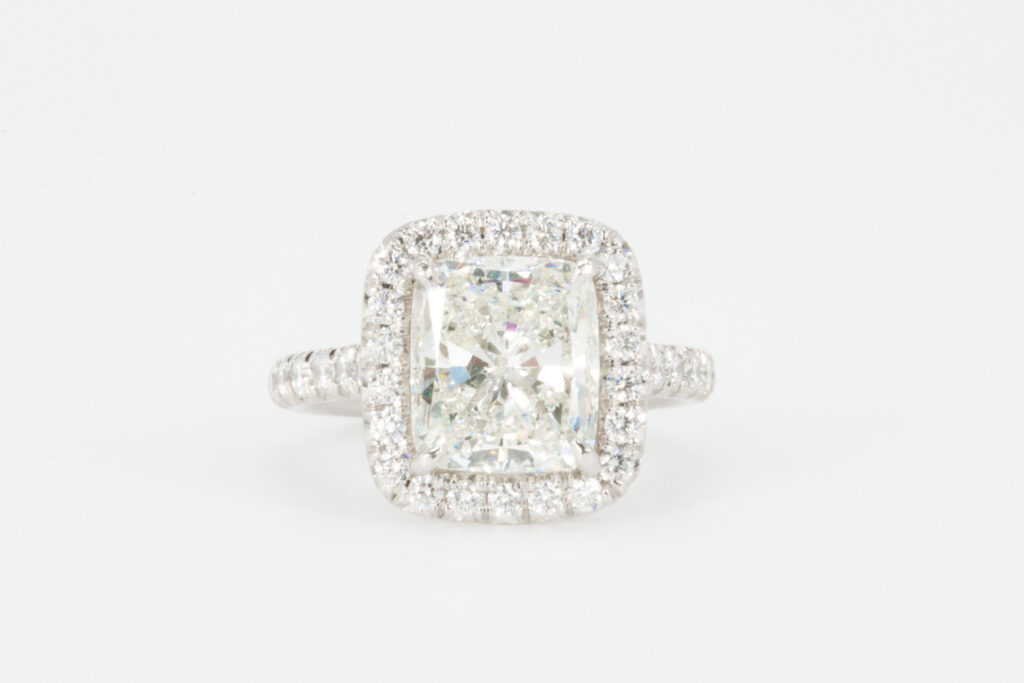 Cushion cut halo engagement ring