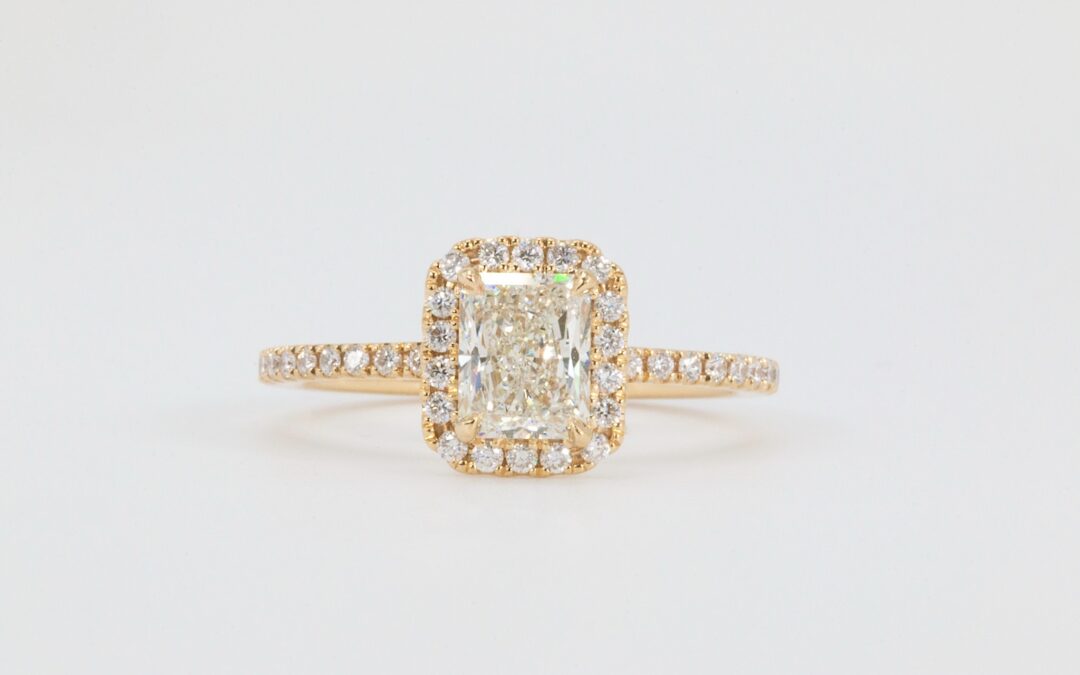 Radiant cut diamond halo yellow gold engagement ring in Houston